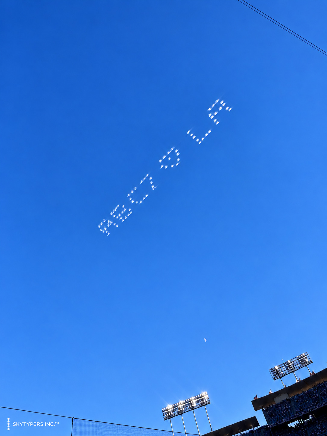 ABC7 skytyping above a stadium, with field lights below.